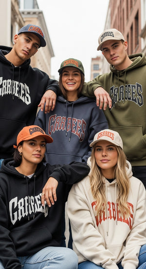Five people wearing branded hoodies and caps in an urban setting